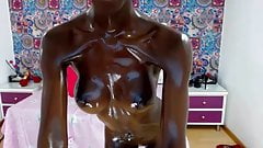 Fit ebony oils up and squirts on webcam