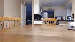 Dirty talking girl masturbates on kitchen table